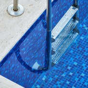 Canva - Swimming Pool With Stainless Steel Ladder.jpg