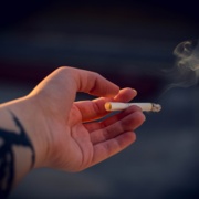 Canva - Close-Up Photography of a Person Holding Cigarette.jpg