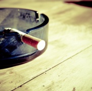 Canva - Lit Cigarette in Ashtray.jpg
