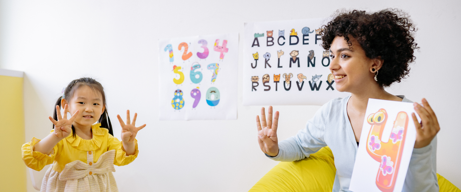 Adult helping child with language development