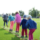 children walking along a ladder