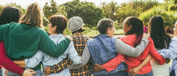 Group of women with arms around eachother