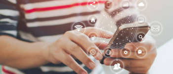 man on phone with app symbols