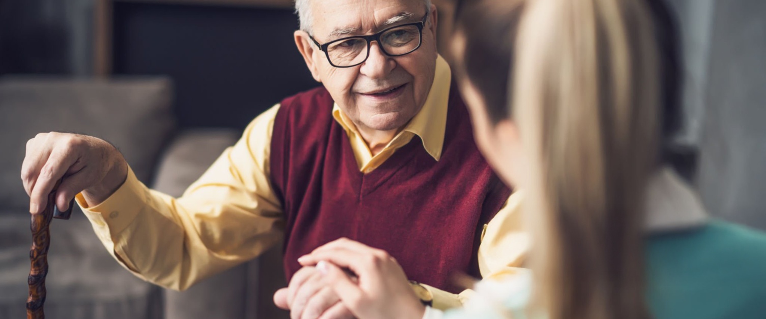 Carer with elderly man