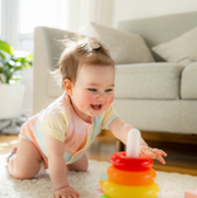 Infant playing on all fours