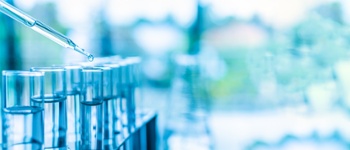 Pipette filling a research vial