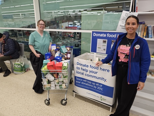 Pharmacy Team from Prince Charles Hospital making a donation to Merthyr Tesco