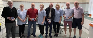 Patients trial the devices at an introductory session with CTM staff (second from left Lindsey Jose, centre Kerry Davies and third from left Menna Payne) and Mike Fardy, Consultant Maxillofacial / Head and Neck Surgeon and Medical Advisor to Faceup Cymru