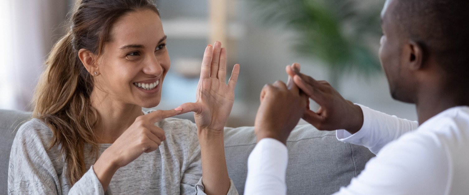 two people signing to each other