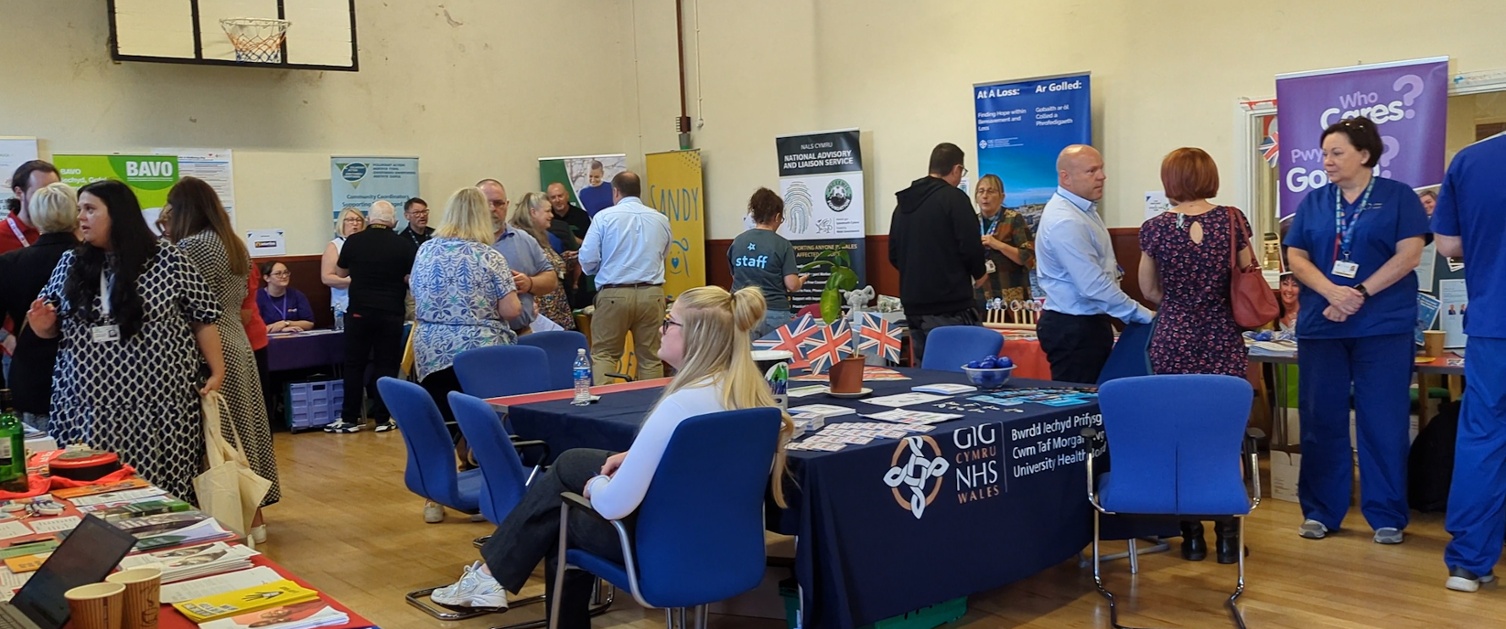 People at information stalls