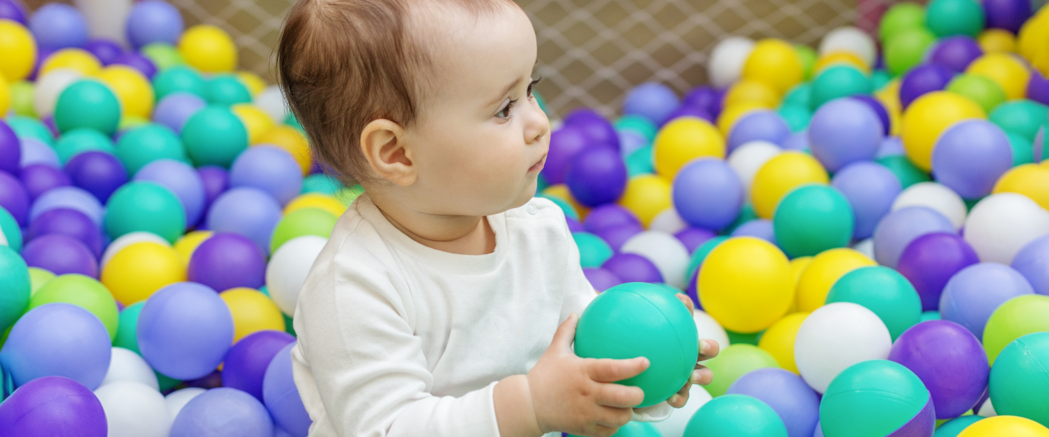 Child playing with a ball