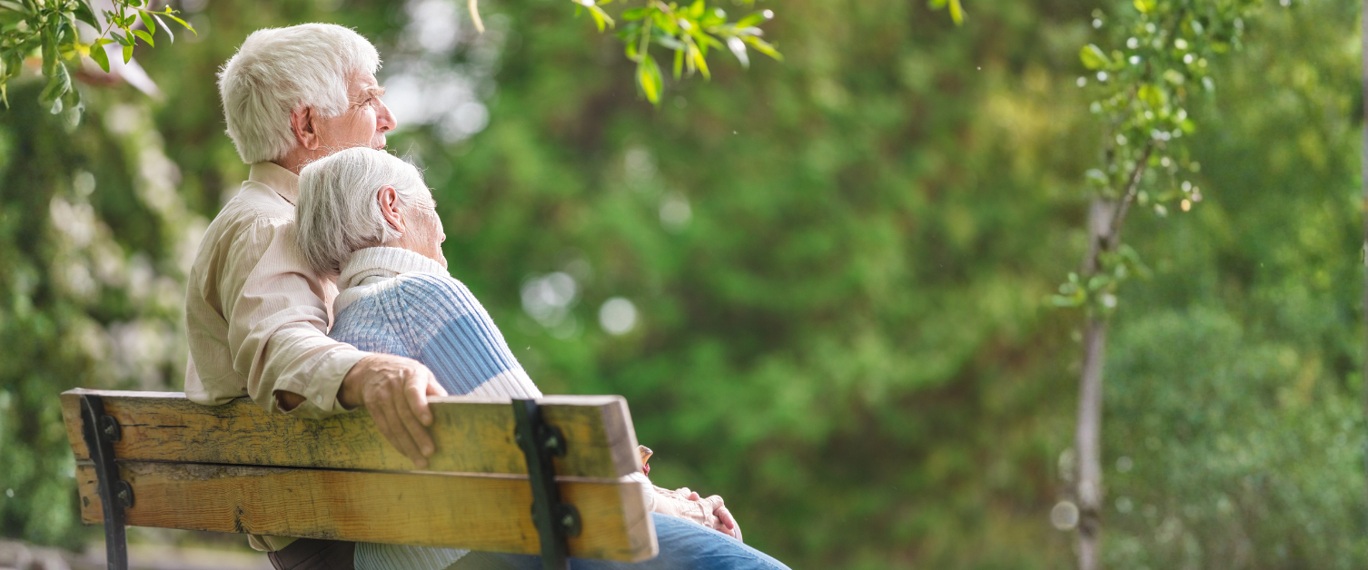elderly couple on a bench