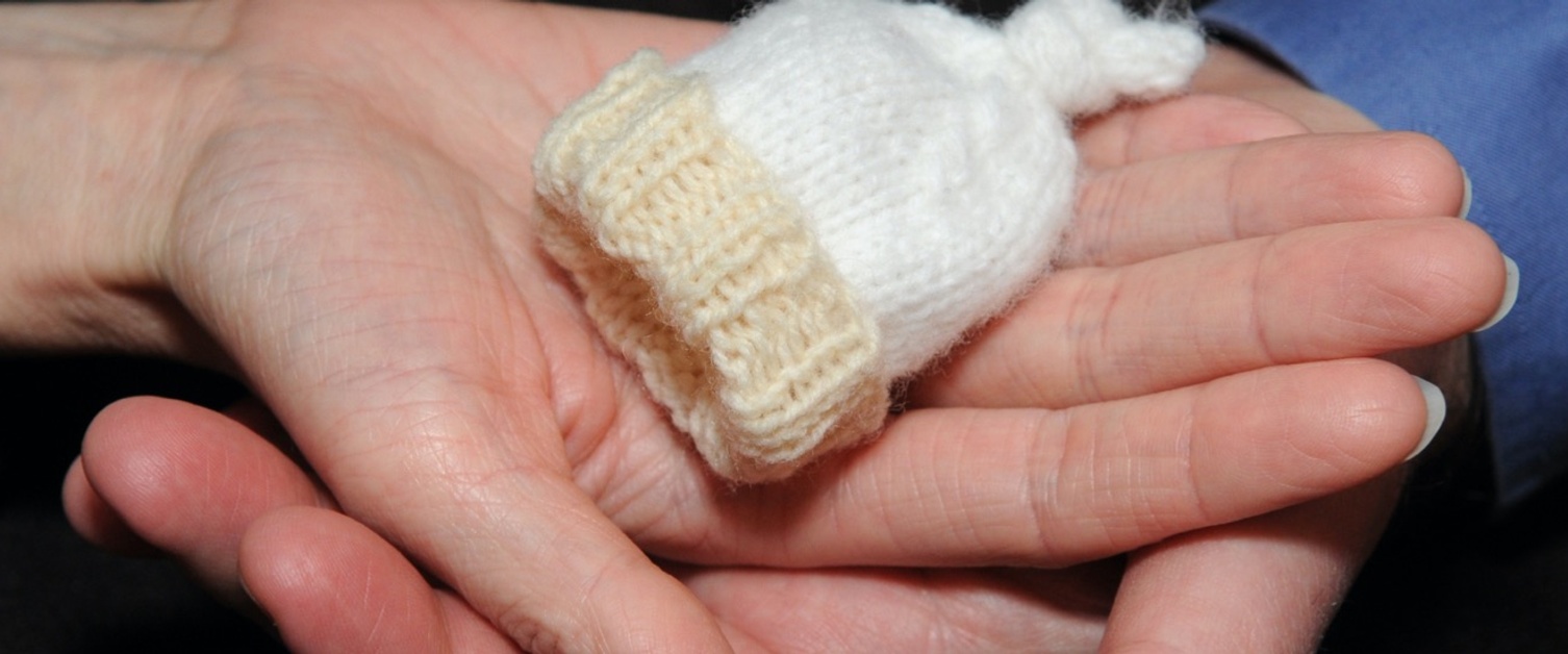 tiny knitted hat