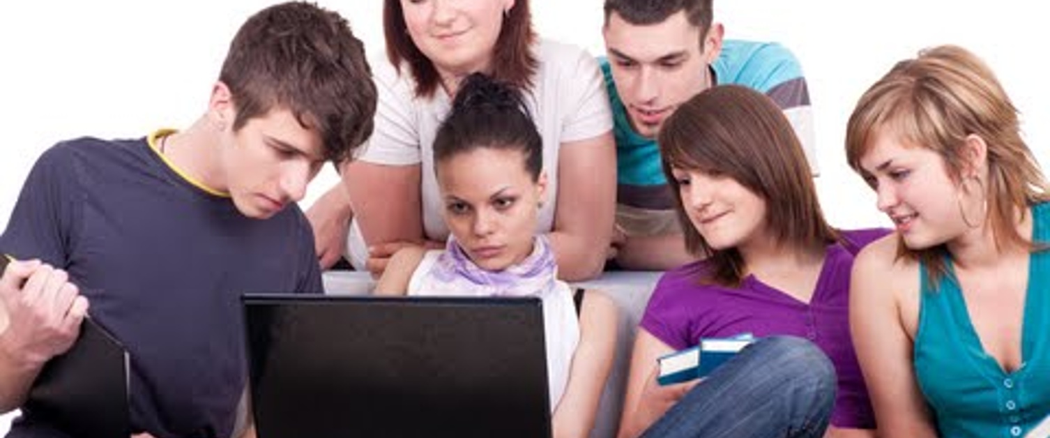 teenagers on a laptop