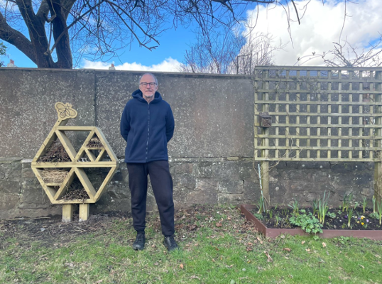 Mr Morgan (Resident) with the bug hotel