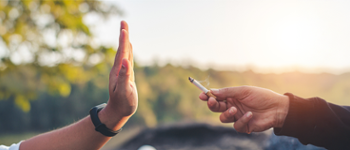 Hand refusing a cigarette