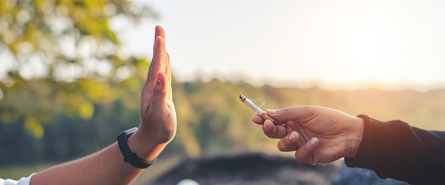 Hand refusing a cigarette