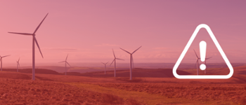 warning symbol on windmill farm