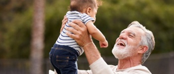 man holding baby