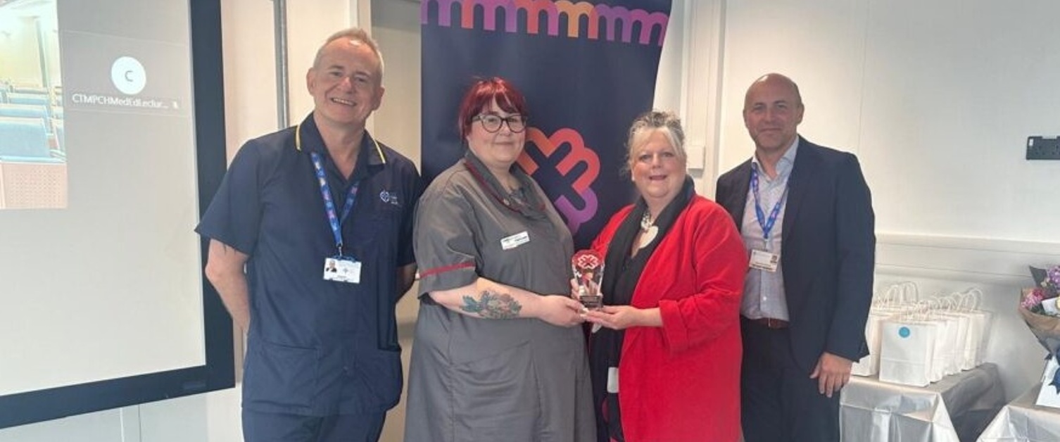 Receiving national award for CTM maternity initiative