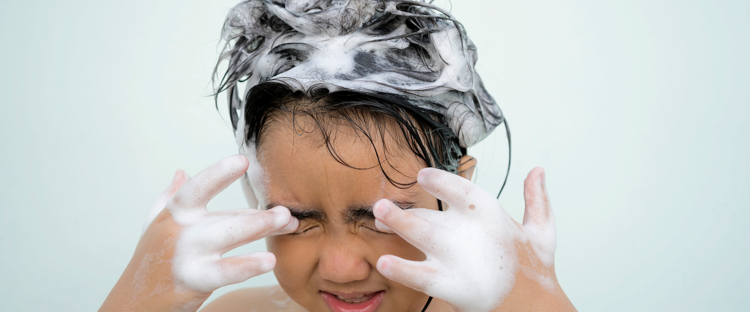 Child washing his hair