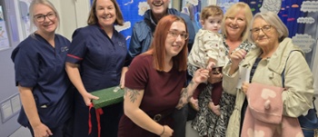 Group Photo of Bryan and Ray James Donation