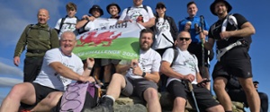 Group photo of CTM staff at top of mountain