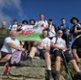 Group photo of CTM staff at top of mountain