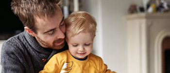 Parent reading story with child