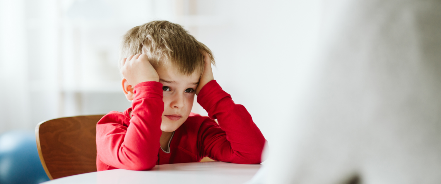 Child sitting at table
