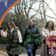 family walking through park