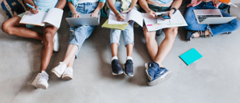 Students sitting down working