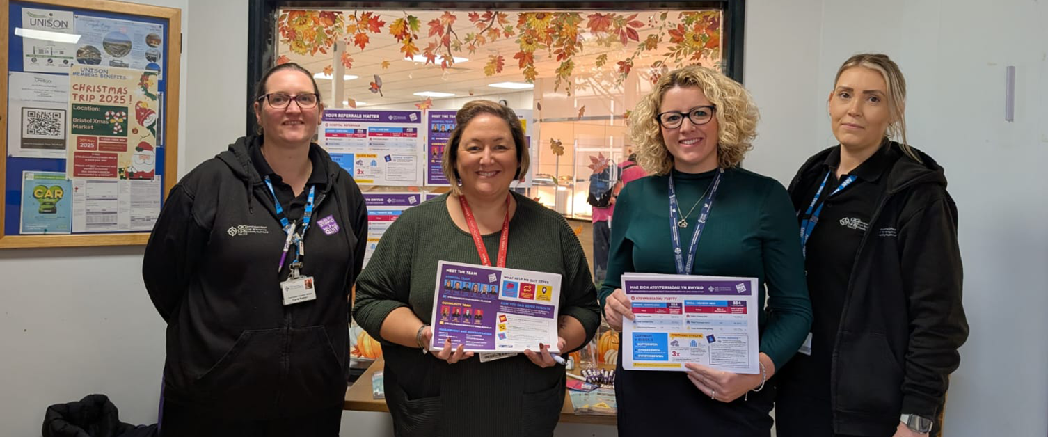 CTM staff with Help Me Quit Posters