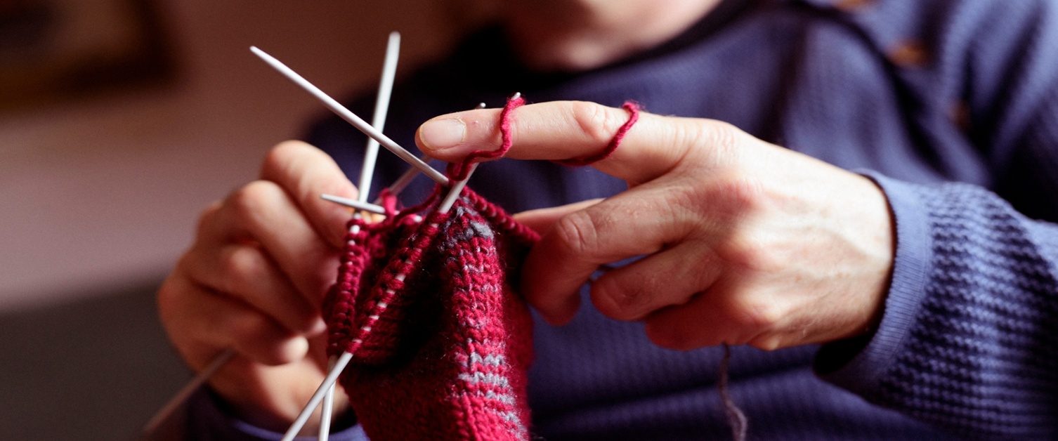 Man Knitting