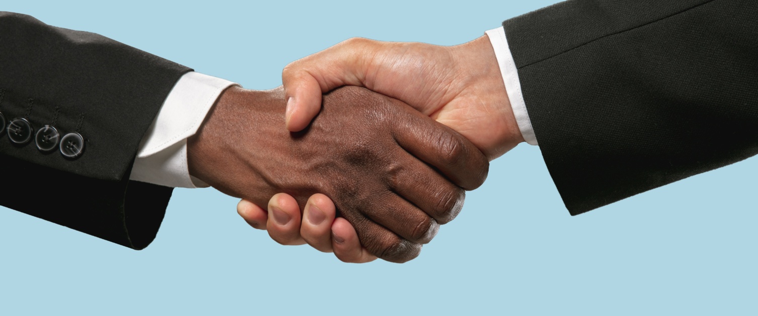 Handshake on blue background