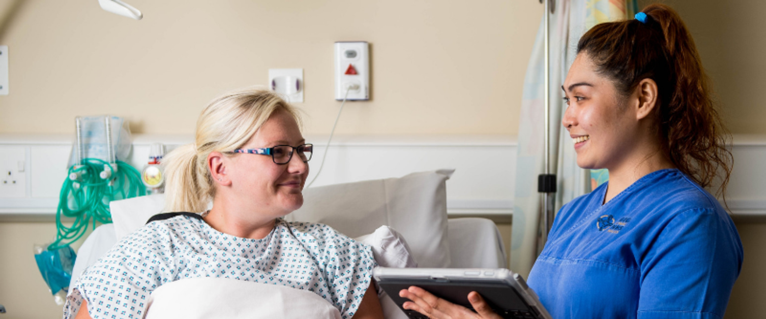 Nurse with patient in hospital