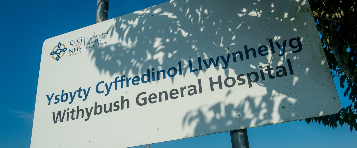 Signpost with the name of Withybush Hospital written on it