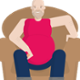 Rhys Jones sitting on his sofa