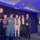 Employees collect transport award