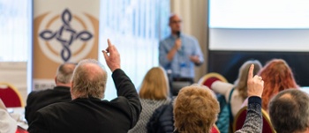 >Members of the community raise questions at the second engagement event in Llanelli