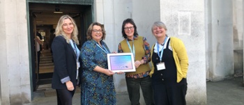 From left to right – Members of their team collect their award - Tricia Roberts (Clinical Nurse Specialist Adult ADHD Service); Wendy Thomas - Head of National Neuro-divergence team in Wales; Catherine Vaughan - Service Delivery Manager Neuro-Developmenta