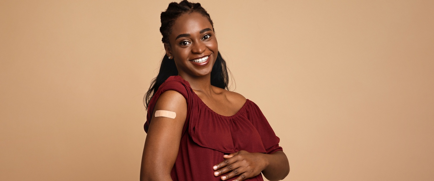 Happy vaccinated pregnant woman