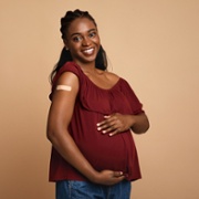 Happy vaccinated pregnant woman.jpg