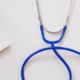 Picture of computer and stethoscope on a white surface