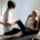 Physiotherapist giving treatment