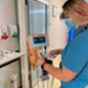 Apprentice working on ward with equipment