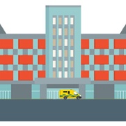 Hospital building with ambulance outside 