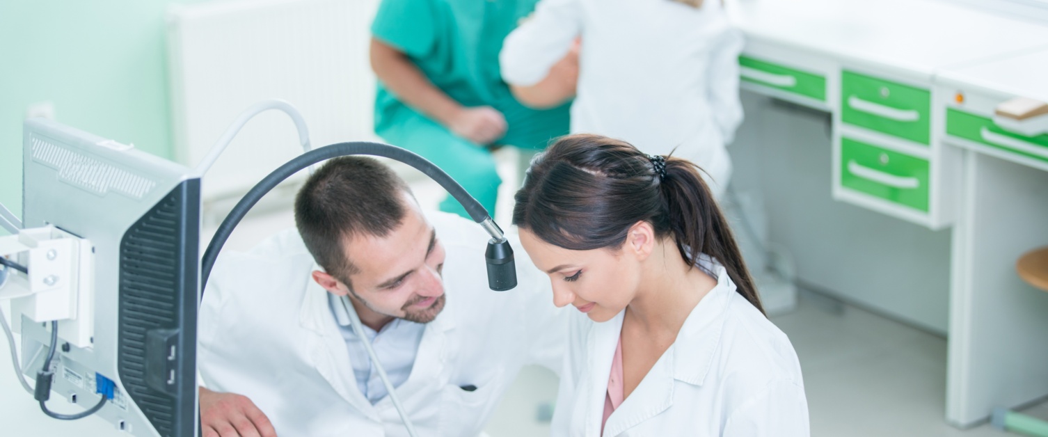 Dentists training with mannequins