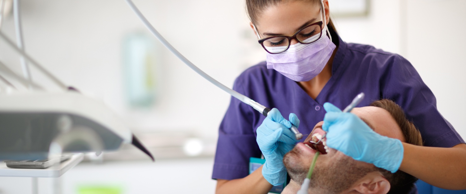 Dentist with a patient