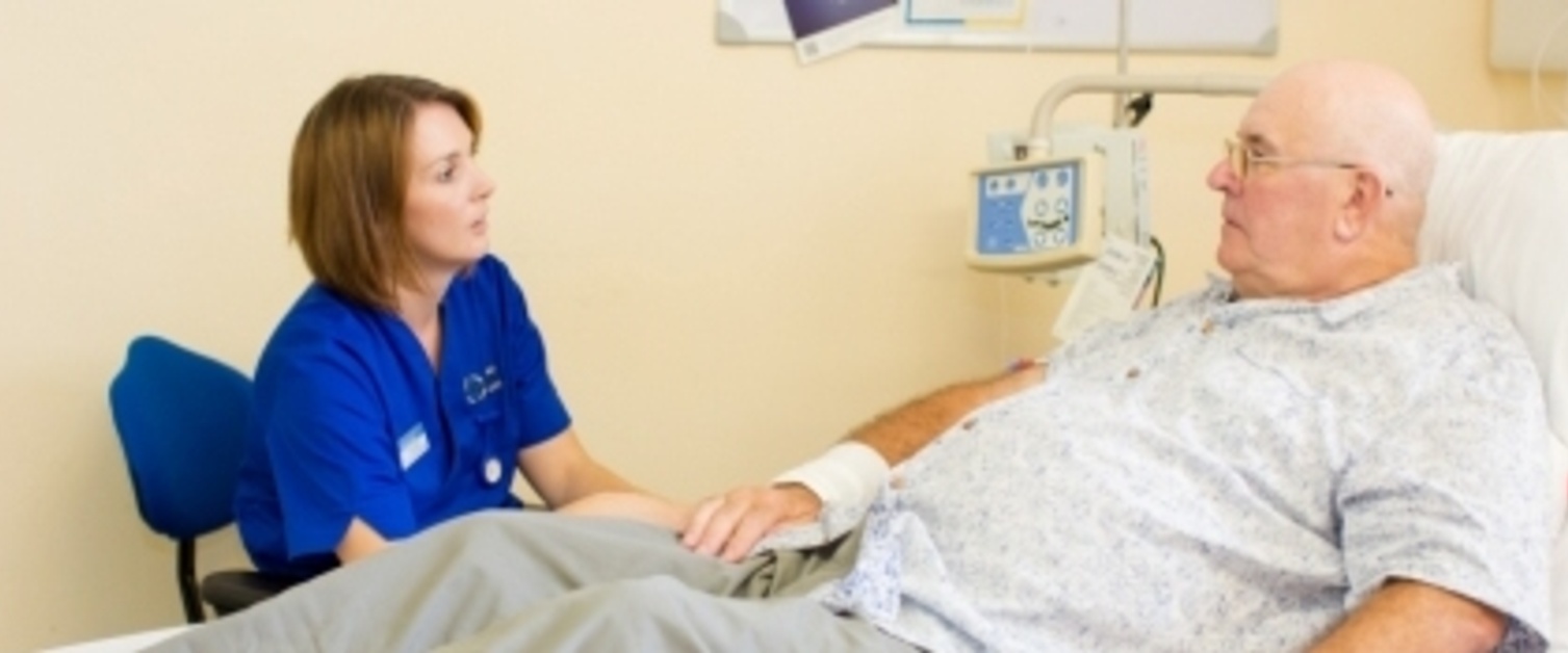 Nurse with elderly man